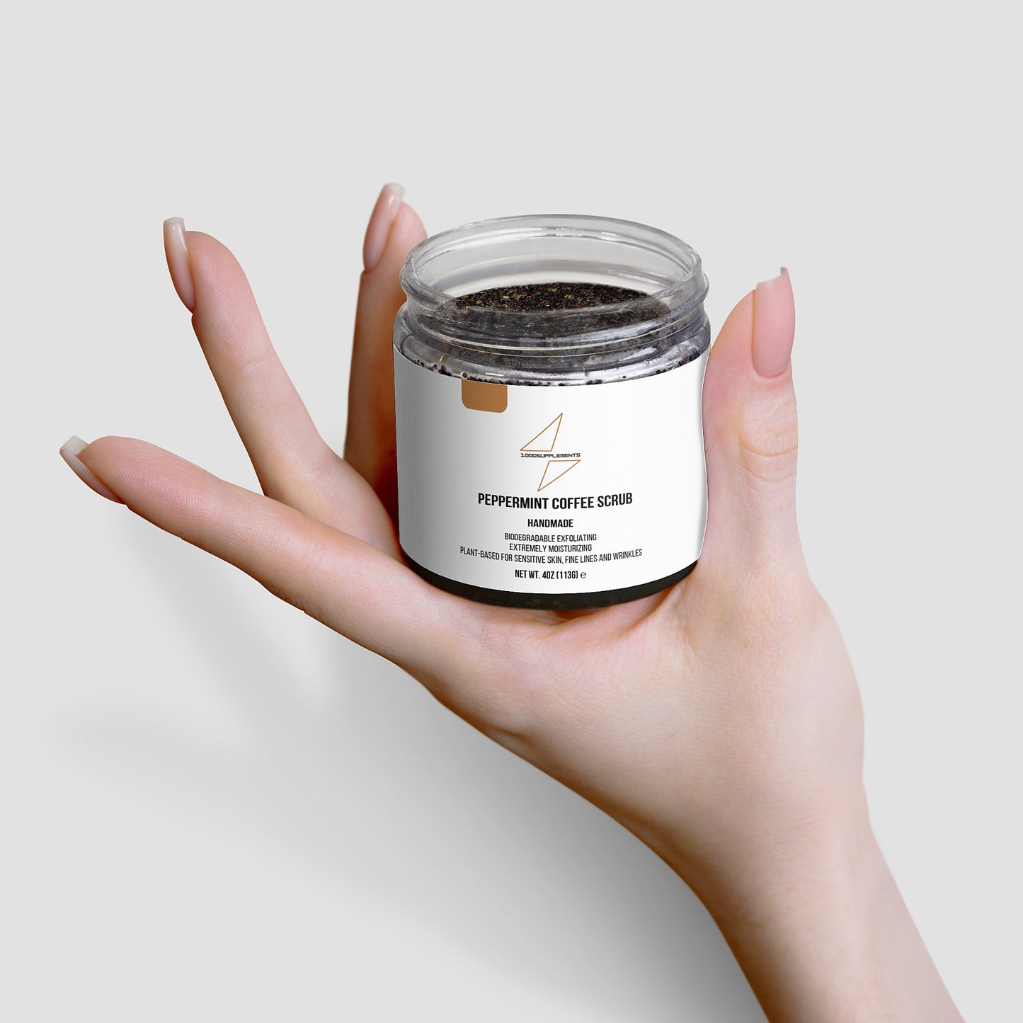 1000Supplements Peppermint Coffee Scrub on palm